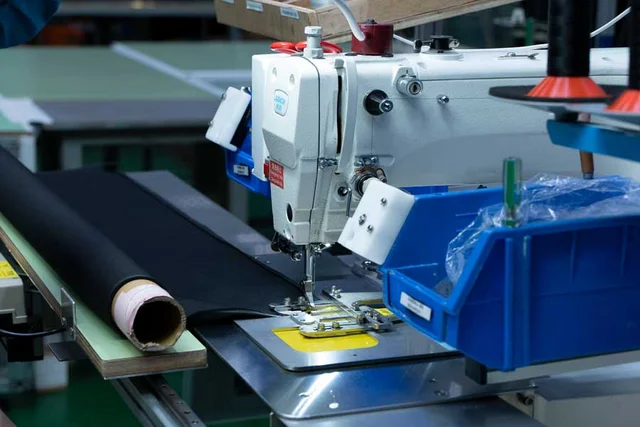 Industrial sewing machines and cutting equipment for professional cut and sew manufacturing