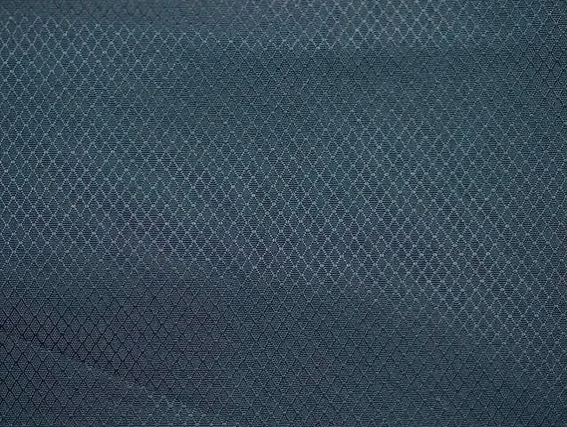 Nylon ripstop fabric with reinforced grid pattern close-up