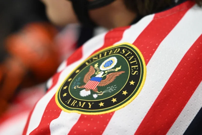 Custom hockey jersey shoulder patch with embroidered team crest detail