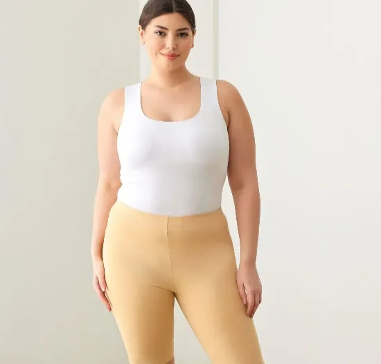 Custom plus size yoga apparel pattern-engineered for curves from XL to 5XL with reinforced waistbands — inclusive size range yoga manufacturer