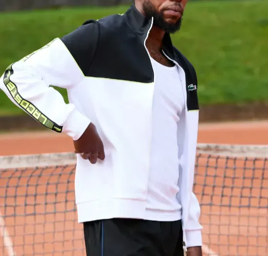 Custom tennis jackets with lightweight warmth and articulated sleeves