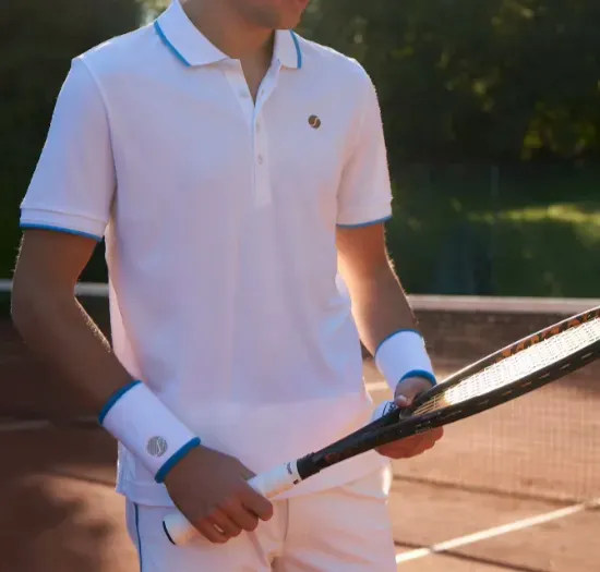 Custom tennis uniforms with matching team colors and sponsor logos
