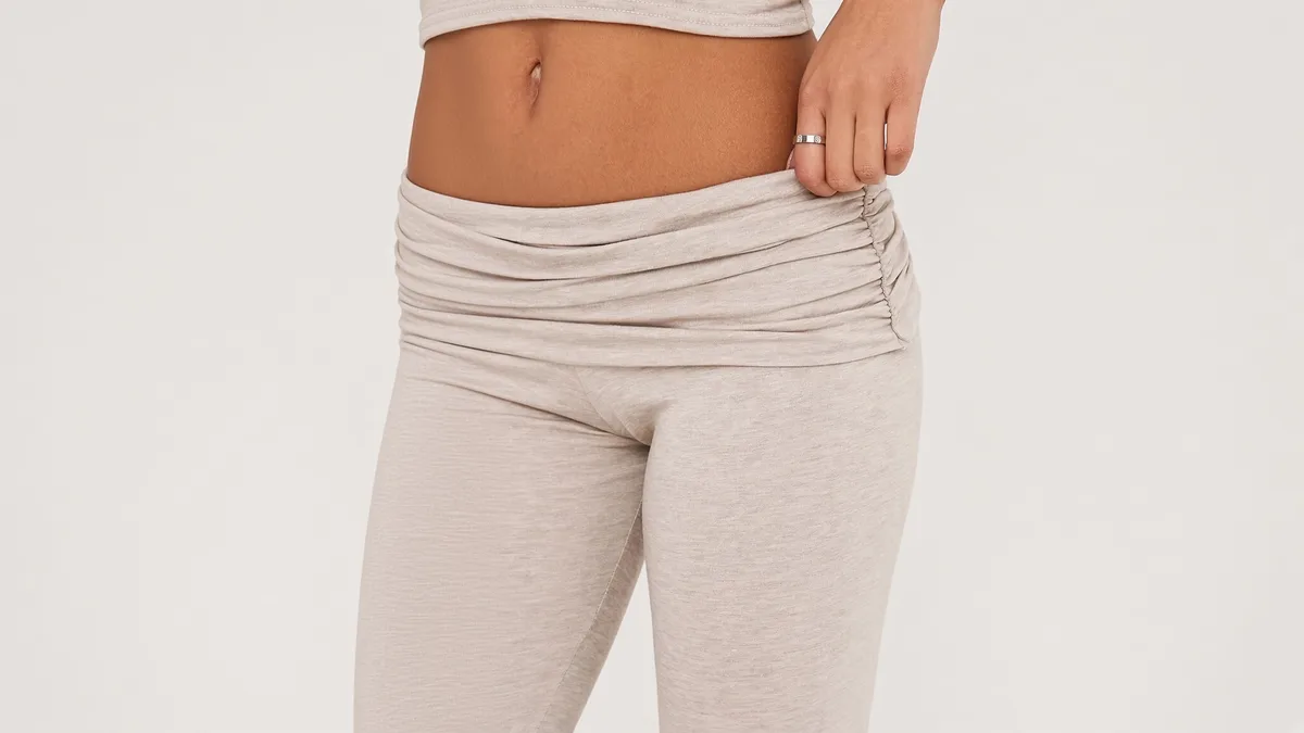 Fold-over waistband yoga leggings — adjustable-rise activewear