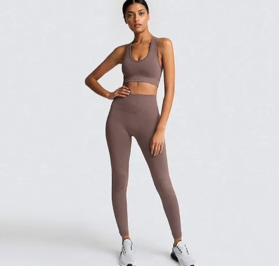 Custom color-matched yoga sets with coordinated bra and legging from the same dye lot — consistent branding for DTC yoga labels