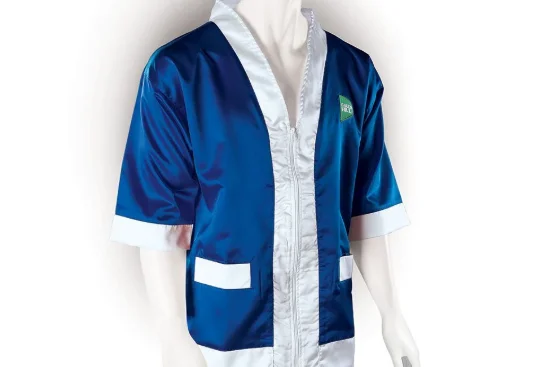 Blue satin boxing walkout robe with white shawl collar, white cuffs, front zip, and a chest crest on a mannequin