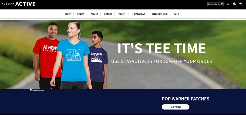 Augusta Active homepage with the Augusta Sportswear logo, a 'It's Tee Time' hero photo of three models on a road, and a Pop Warner Patches promotion