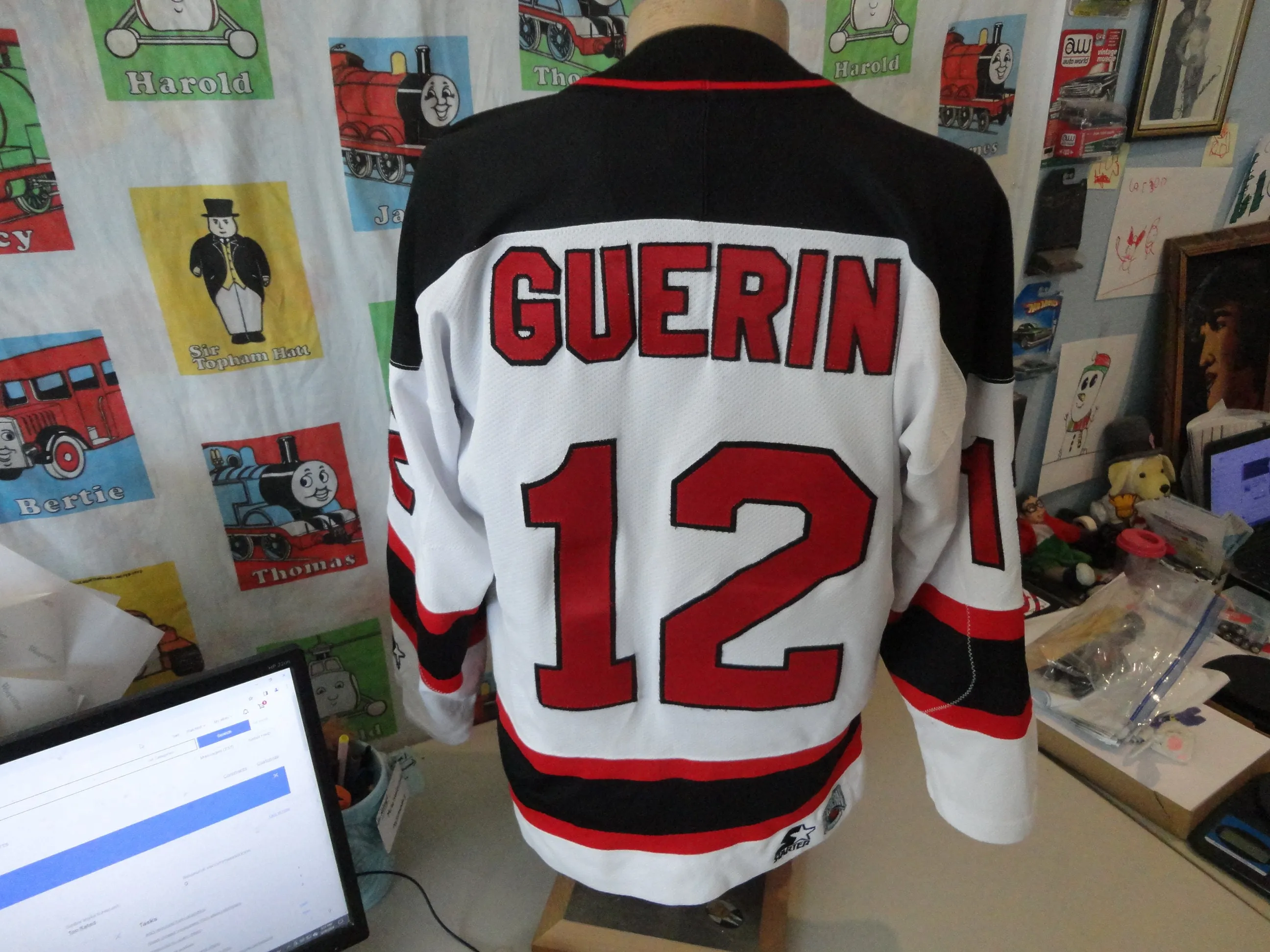 Custom hockey jersey with player name and number on back nameplate