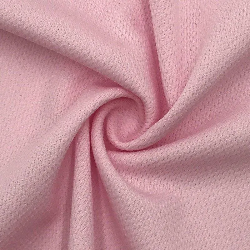 Breathable performance mesh fabric with moisture-management knit pattern