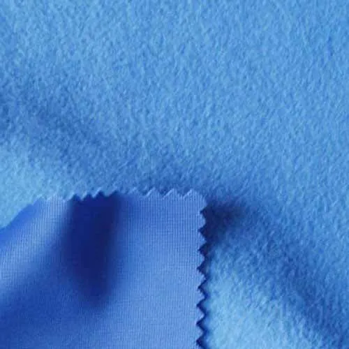 Brushed tricot polyester fabric with micro-sanded surface — silent outer shell material for close-range whitetail hunting garments