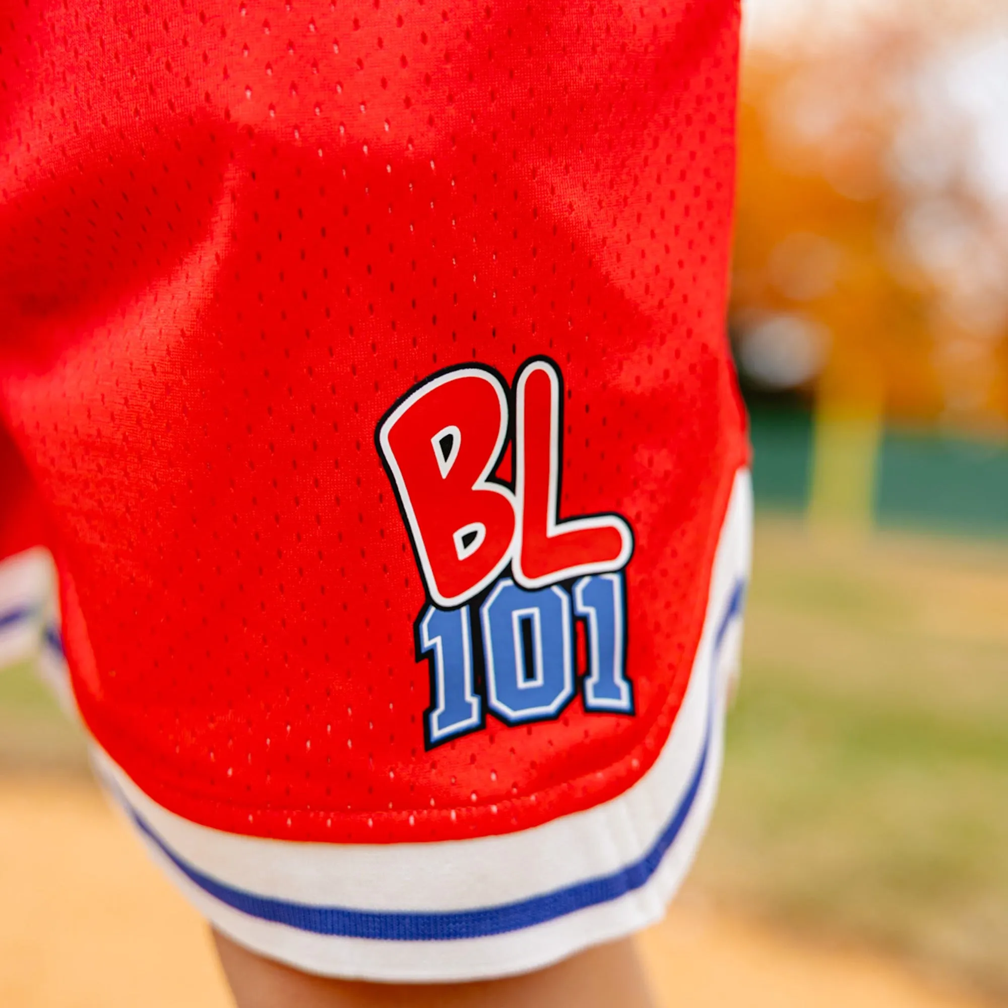 Custom boxing apparel with precise logo placement on front and sleeves