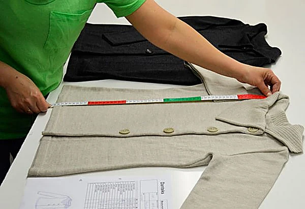 Garment inspection against the approved spec before dispatch
