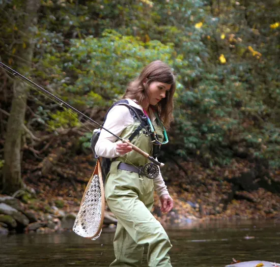 Custom fishing waders with waterproof construction and reinforced knees