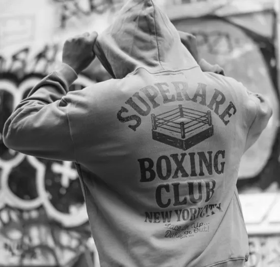 Custom boxing hoodie with branded logo and fighter graphics