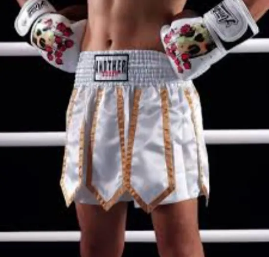 Custom boxing shorts with sublimated team colors and logo