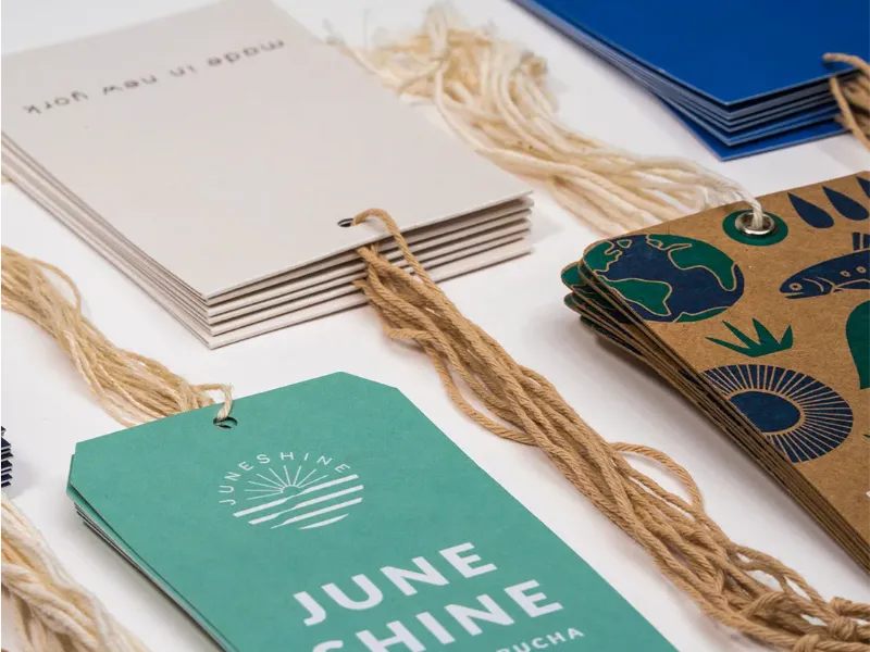 Custom printed hang tags with brand logo for private label apparel collections