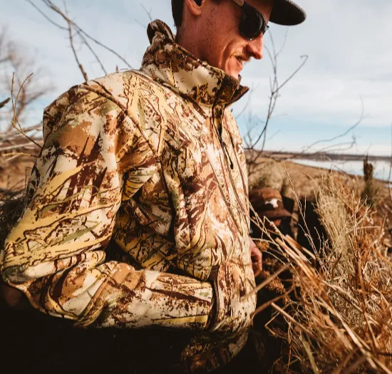 Custom hunting jacket with Realtree camo and Primaloft insulation — silent brushed tricot outer shell for tree stand and spot-and-stalk hunts
