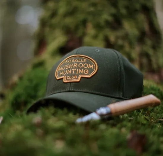 Custom hunting beanie and cap with Realtree camo pattern and thermal fleece lining — cold-weather headwear for stand and field hunters