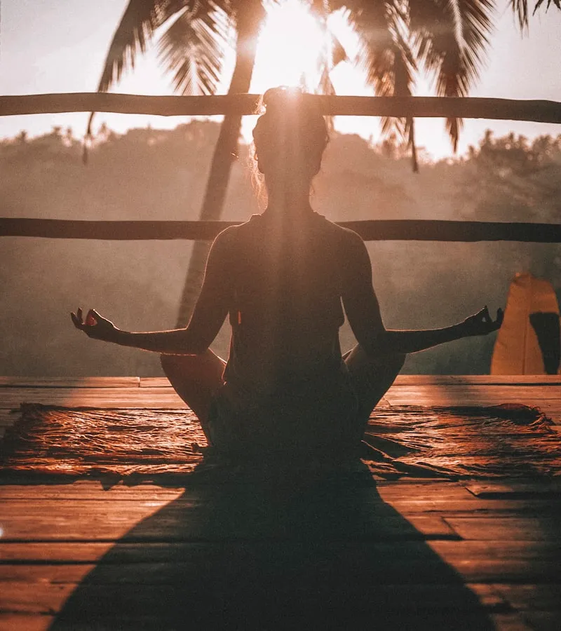 Yoga practitioner in nature wearing sustainable yoga apparel